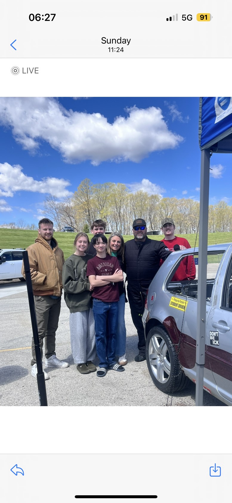 Family photo next to the GTI in the paddock