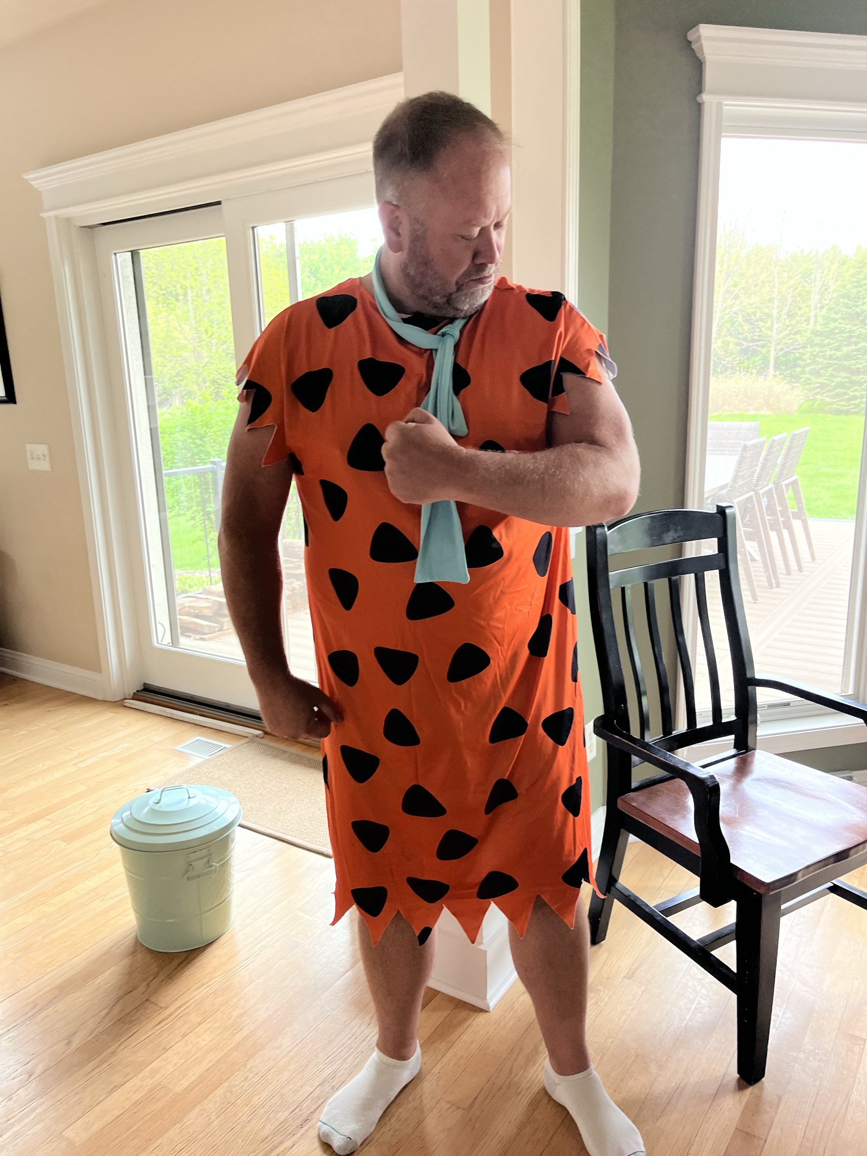 Tom in Flintstones costume